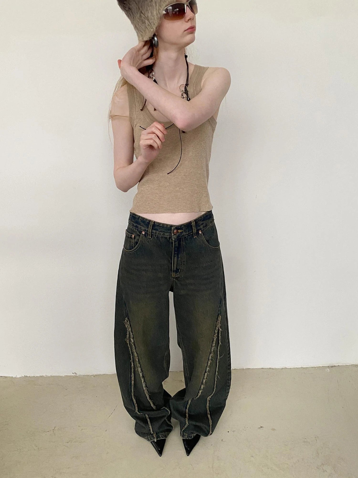 Distressed Washed Blue Denim Jeans With Frayed Hem