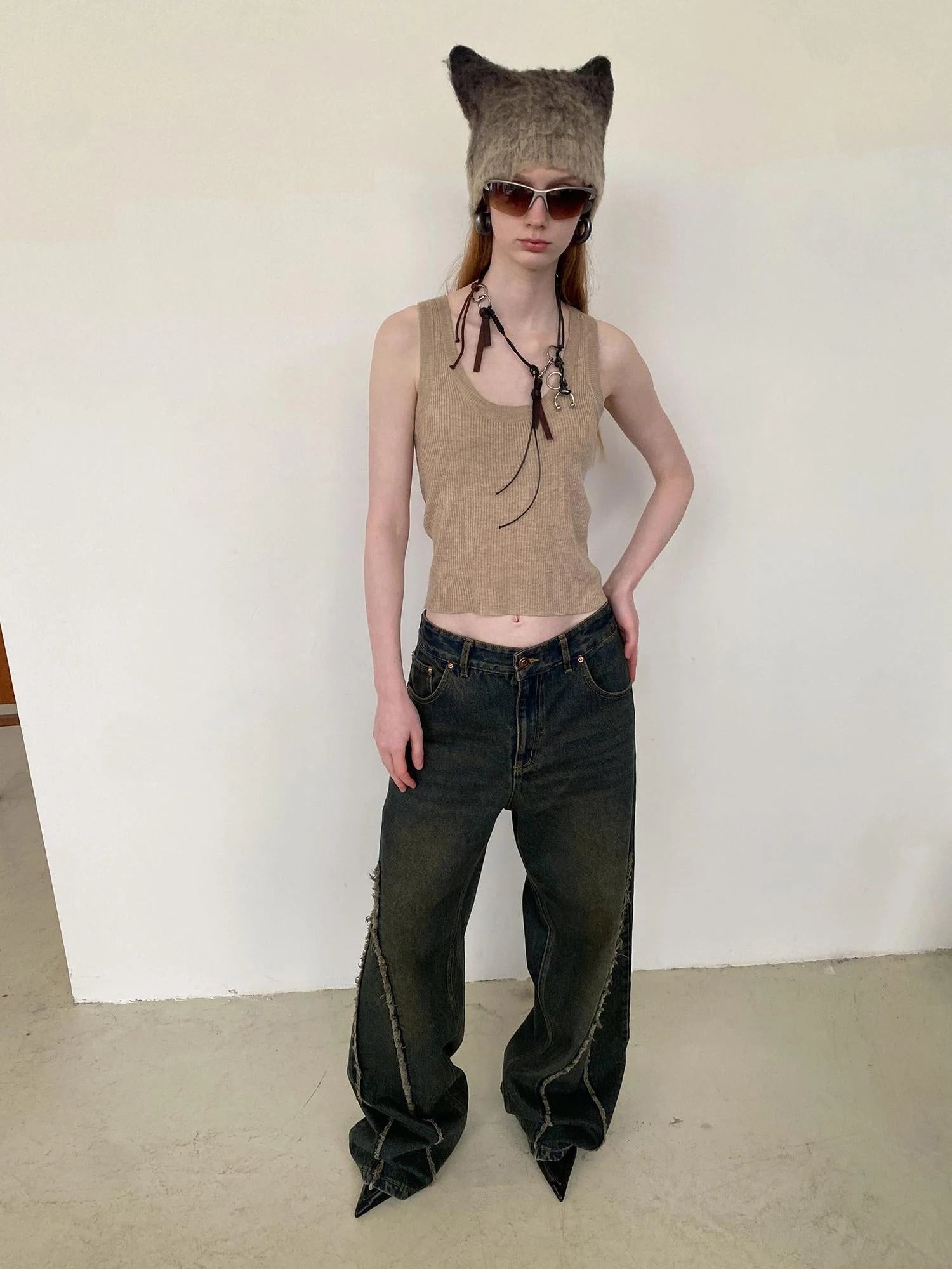 Distressed Washed Blue Denim Jeans With Frayed Hem