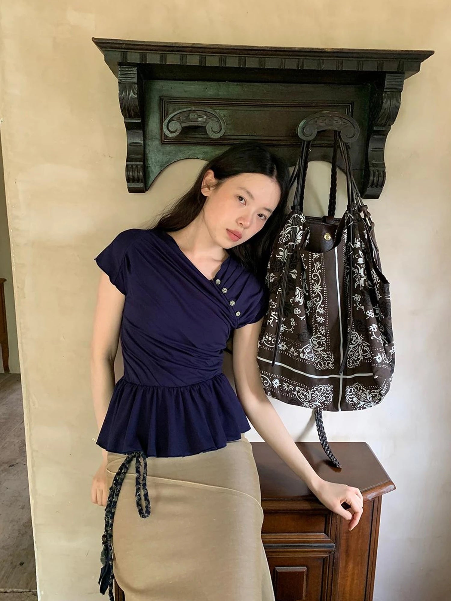 Asymmetrical Placket Tuck Detail Tee With Flounced Hem