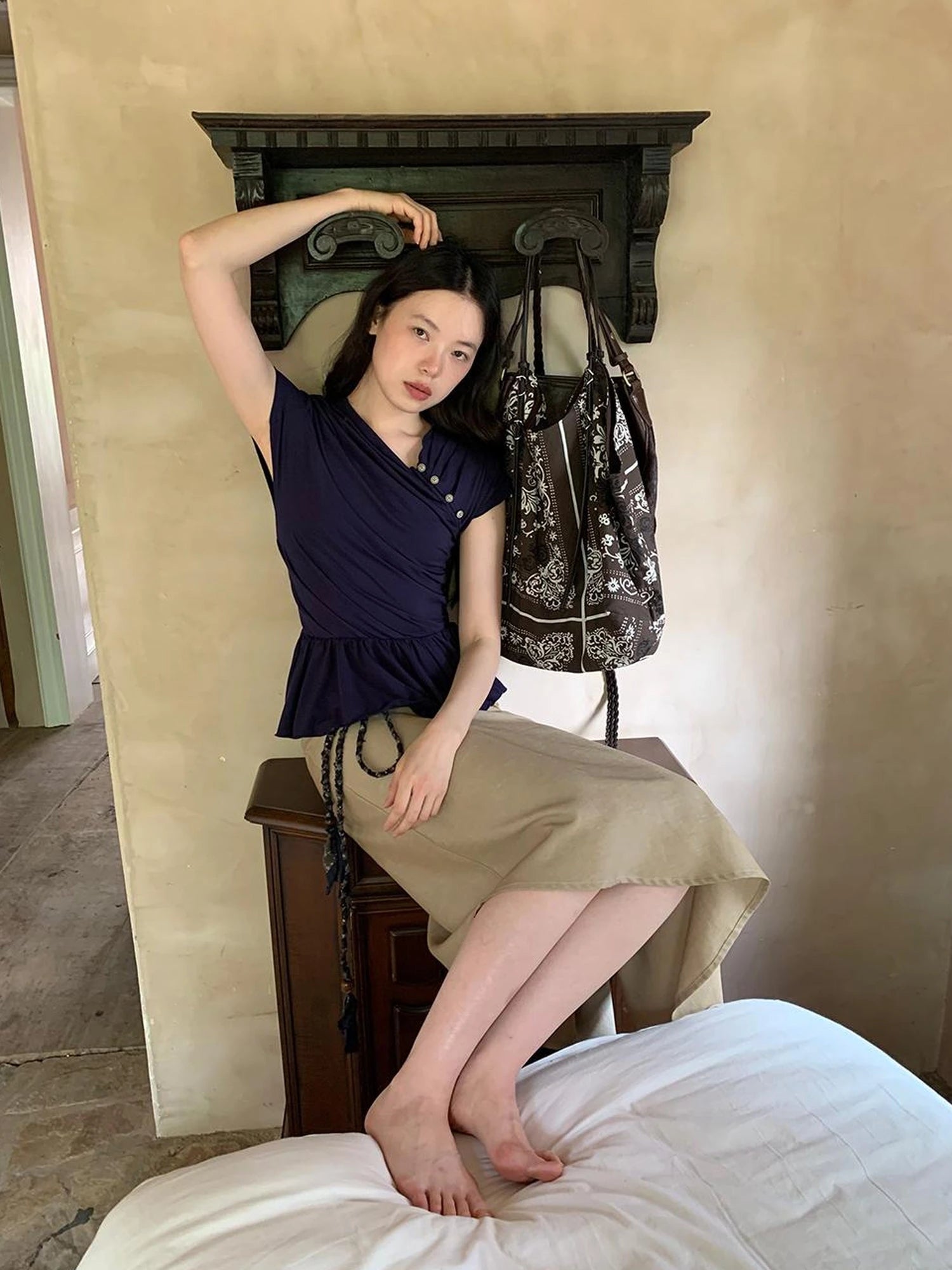 Asymmetrical Placket Tuck Detail Tee With Flounced Hem