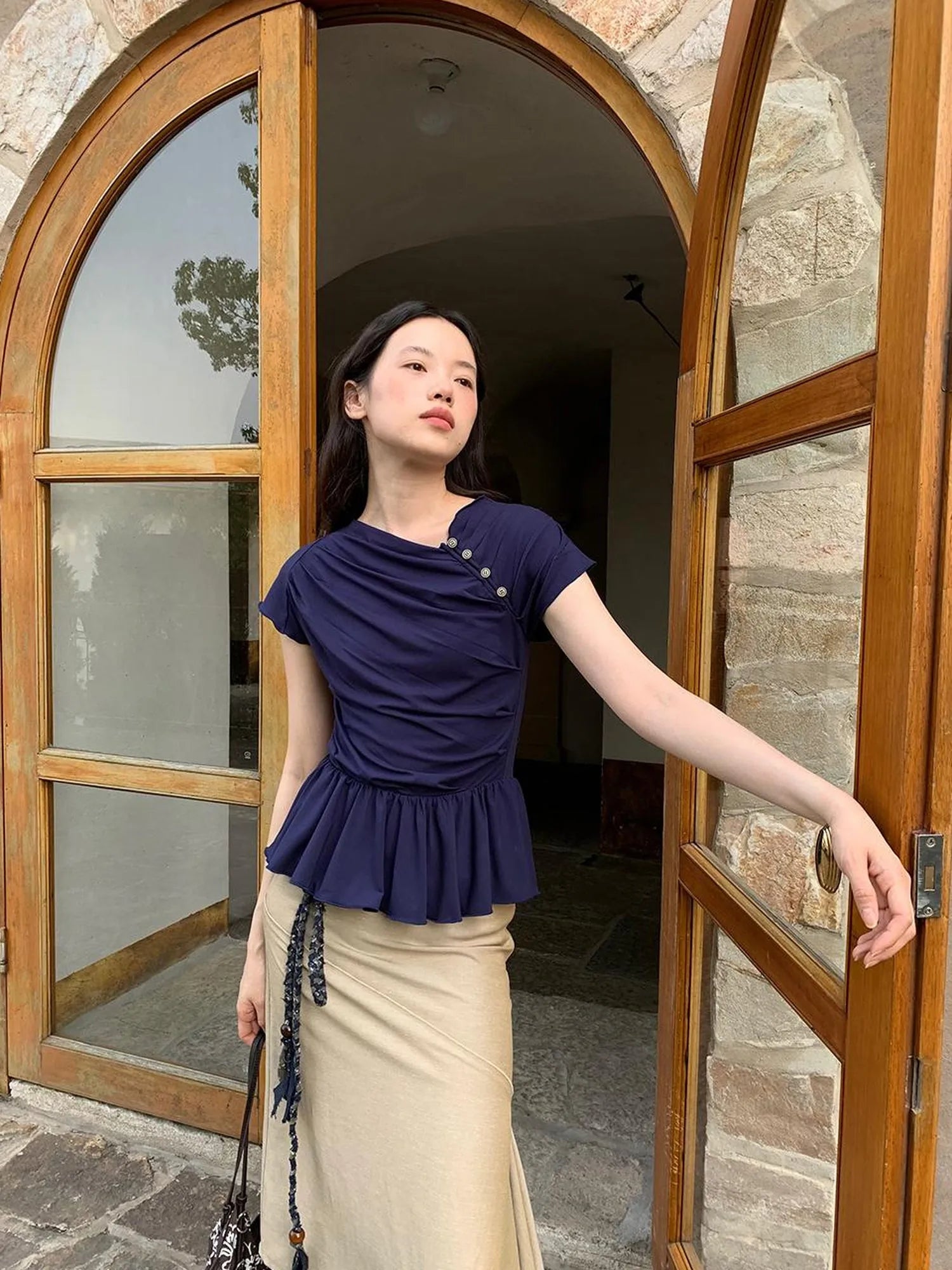 Asymmetrical Placket Tuck Detail Tee With Flounced Hem