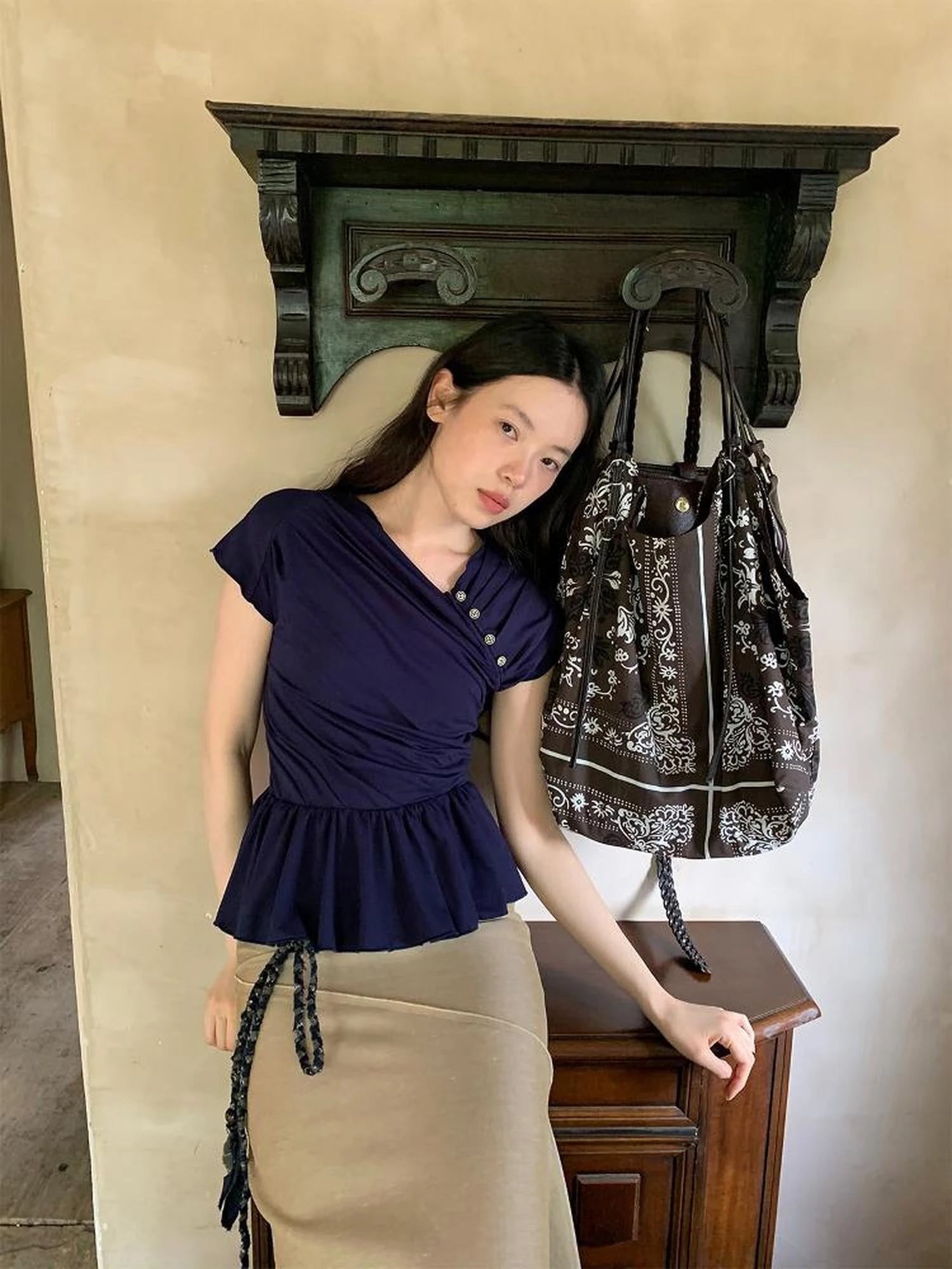 Asymmetrical Placket Tuck Detail Tee With Flounced Hem