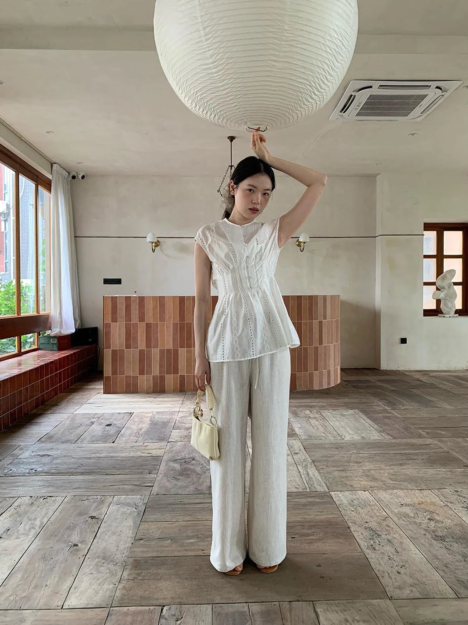 Dorydory Stripe Jacquard Sleeveless Shirt with Waist Cutout