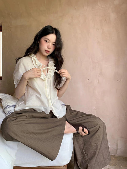 V-Neck Short Sleeve Shirt with Lace-Up Detail and Raglan Sleeves