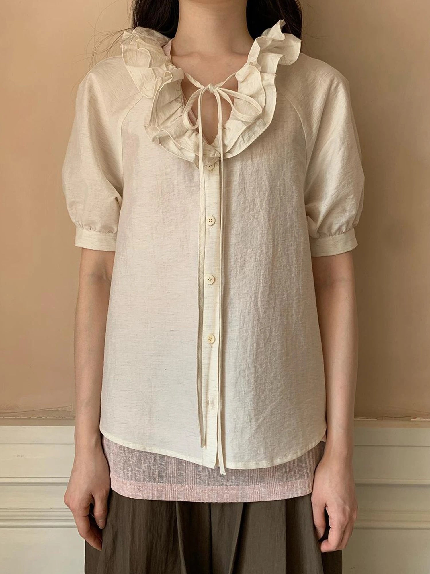 V-Neck Short Sleeve Shirt with Lace-Up Detail and Raglan Sleeves