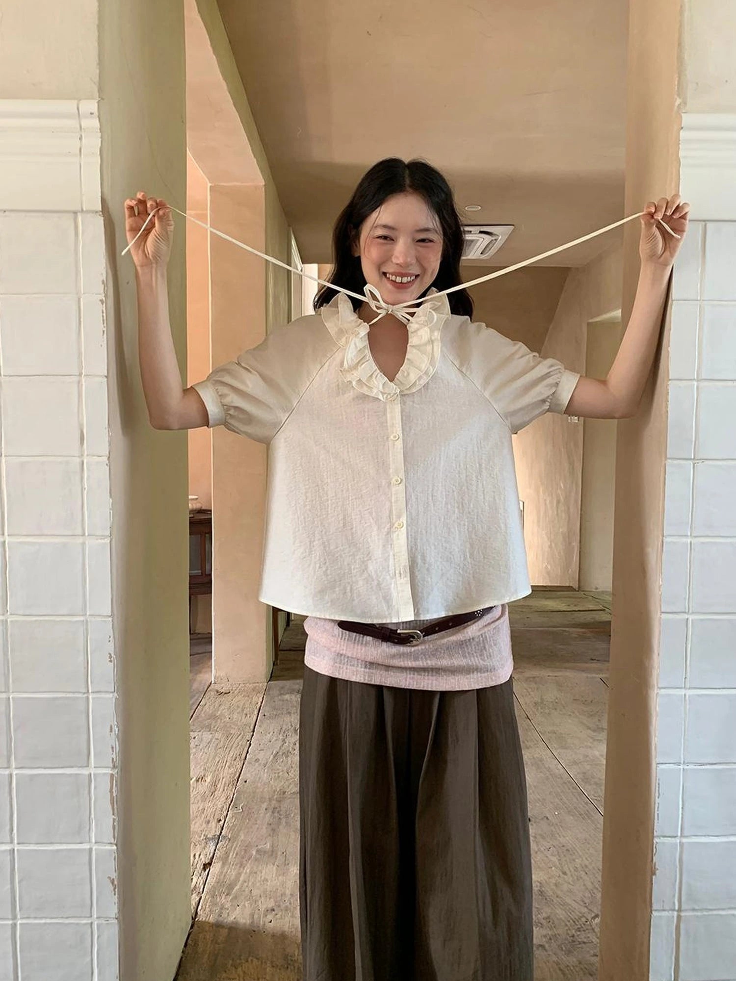 V-Neck Short Sleeve Shirt with Lace-Up Detail and Raglan Sleeves