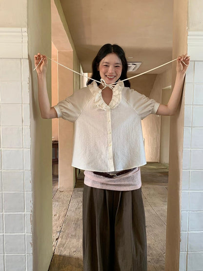 V-Neck Short Sleeve Shirt with Lace-Up Detail and Raglan Sleeves