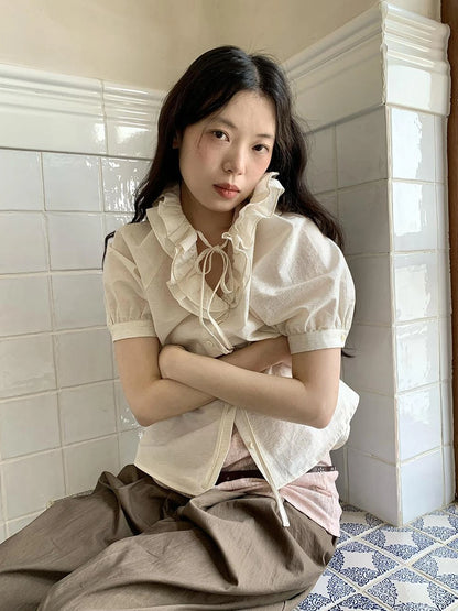 V-Neck Short Sleeve Shirt with Lace-Up Detail and Raglan Sleeves