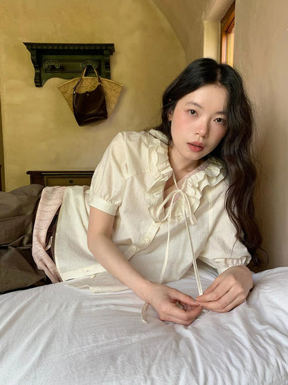 V-Neck Short Sleeve Shirt with Lace-Up Detail and Raglan Sleeves