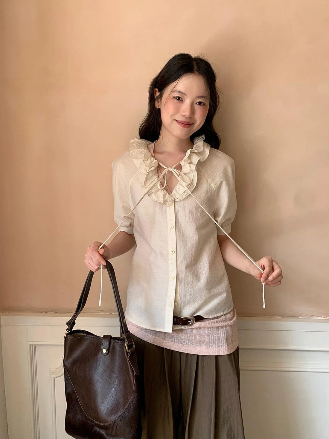 V-Neck Short Sleeve Shirt with Lace-Up Detail and Raglan Sleeves