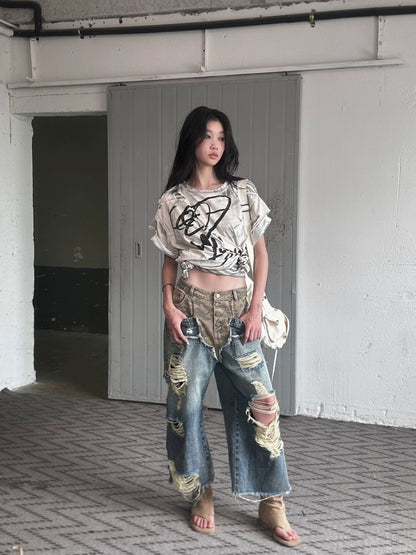 FULLTIDE Durable Deconstructed Patchwork Low Waist Ripped Camo Denim Relaxed Button Jeans