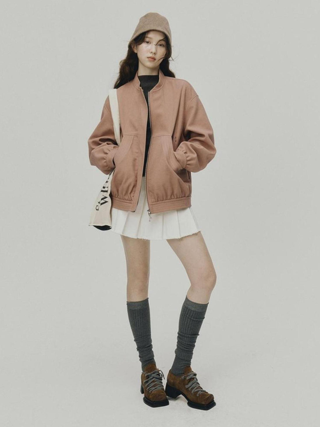 FUSSED 24 Aw Textured Ceramic Blush Baseball Jacket With Deconstructed Panels