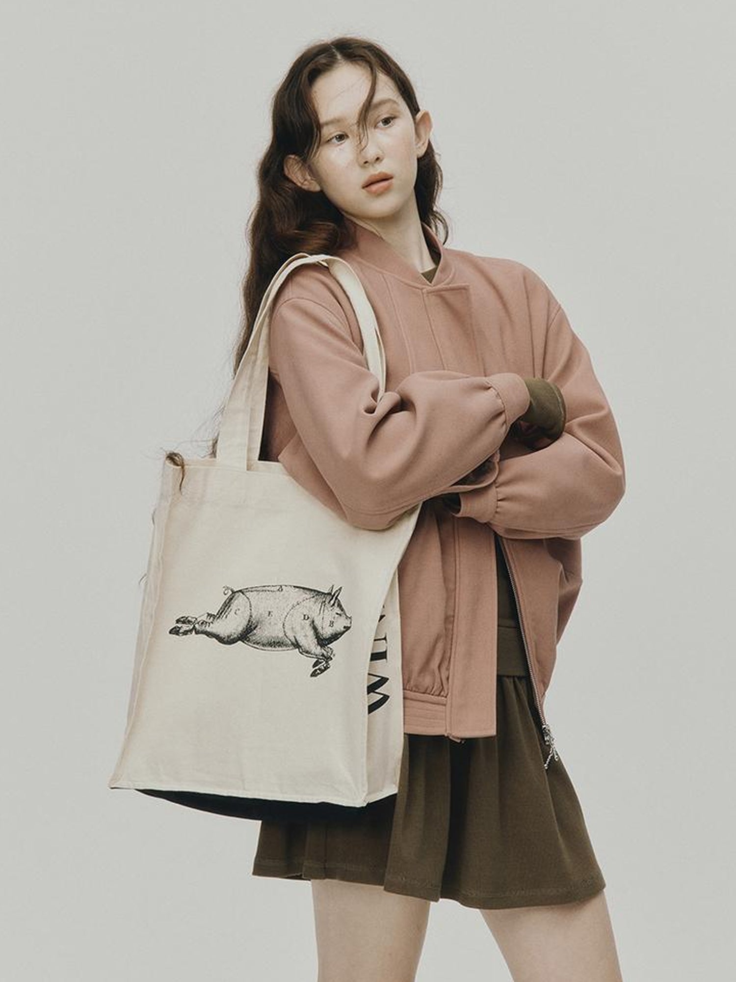 FUSSED 24 Aw Textured Ceramic Blush Baseball Jacket With Deconstructed Panels