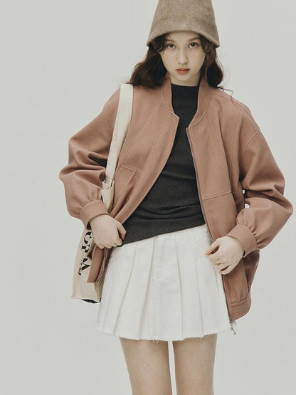 FUSSED 24 Aw Textured Ceramic Blush Baseball Jacket With Deconstructed Panels
