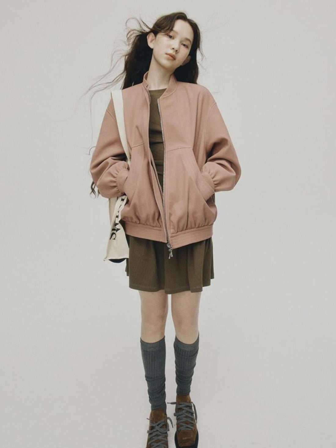 FUSSED 24 Aw Textured Ceramic Blush Baseball Jacket With Deconstructed Panels
