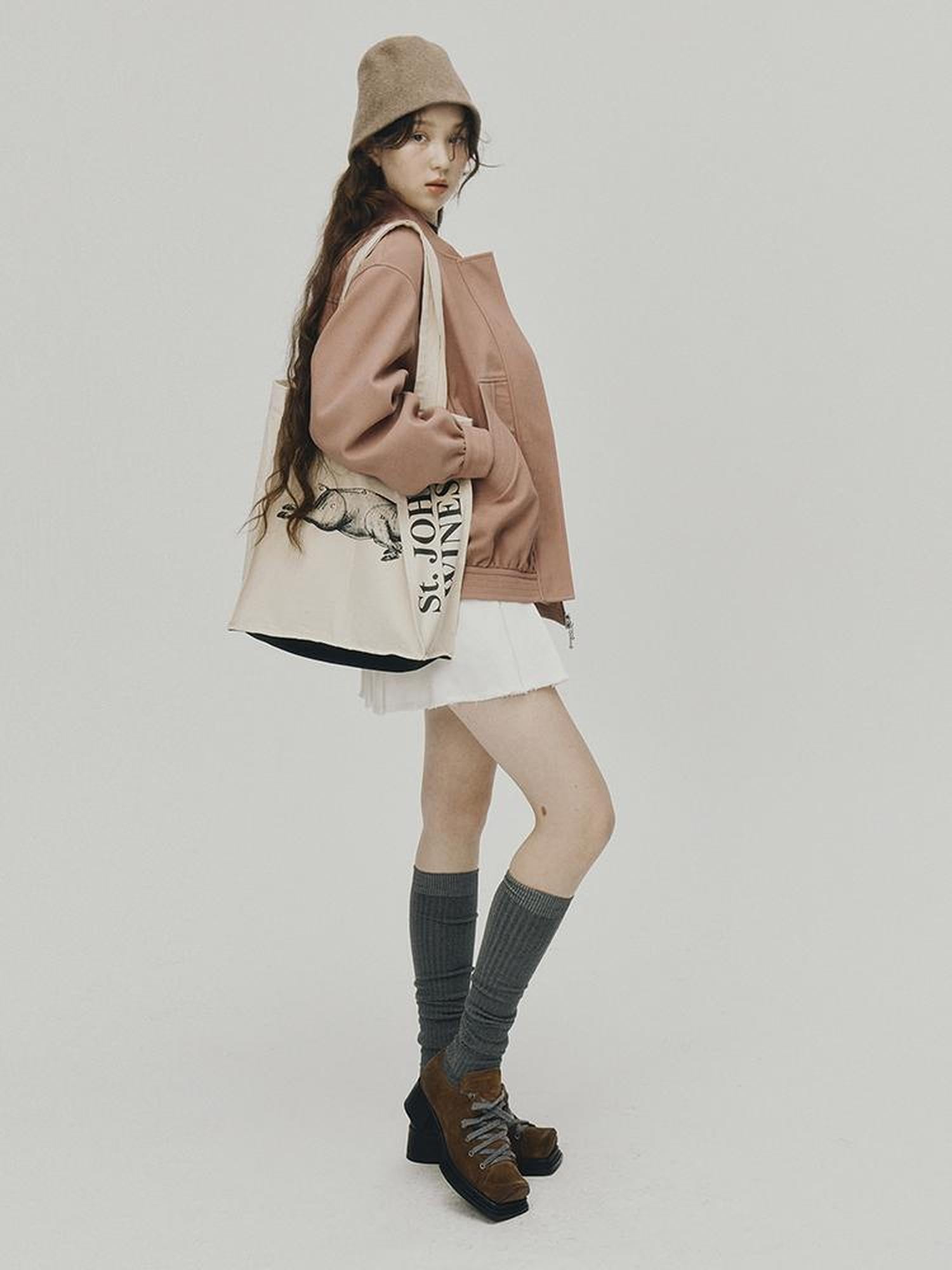 FUSSED 24 Aw Textured Ceramic Blush Baseball Jacket With Deconstructed Panels