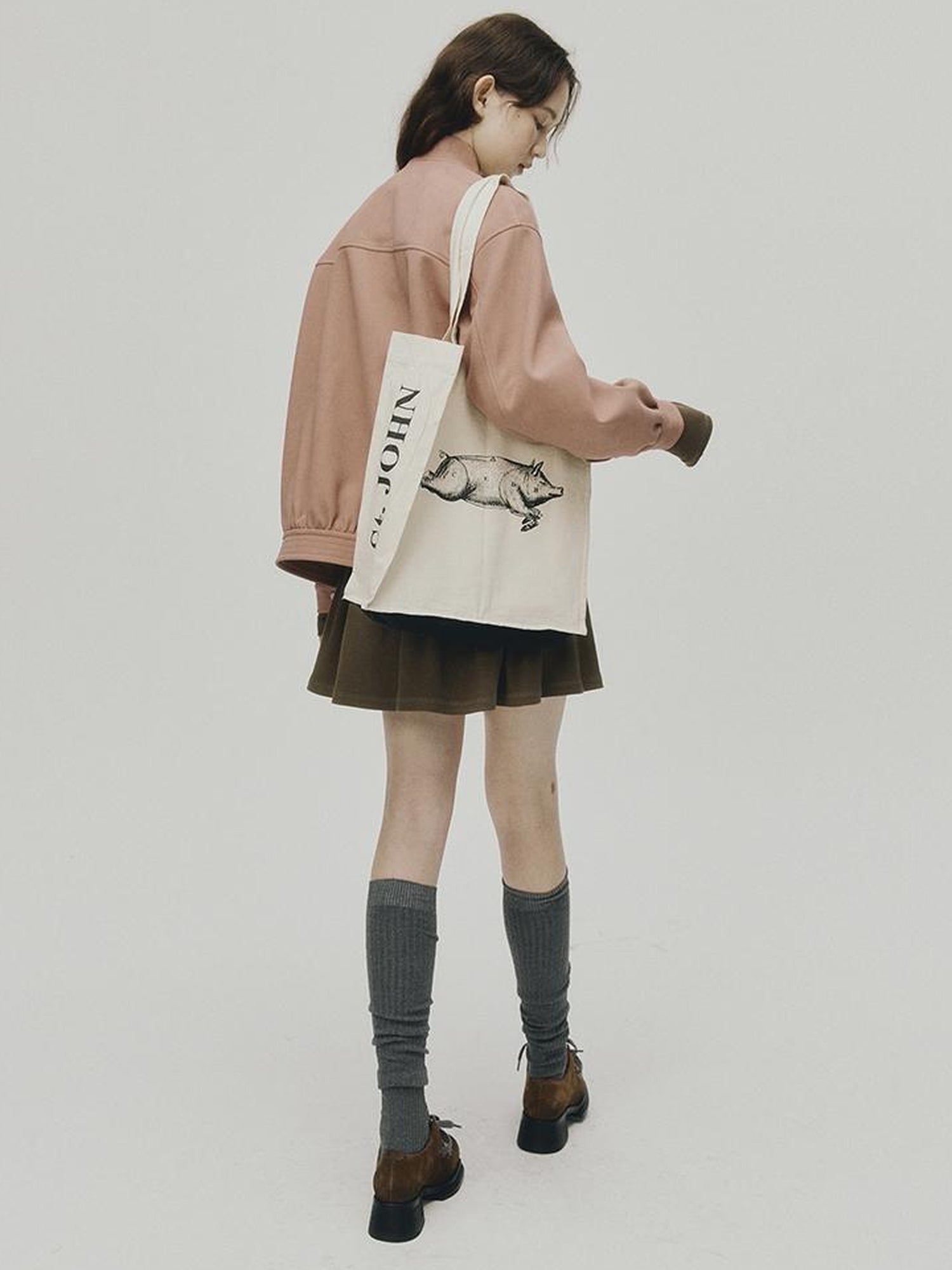 FUSSED 24 Aw Textured Ceramic Blush Baseball Jacket With Deconstructed Panels