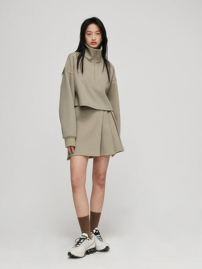 FUSSED A Line Pleated Pique Cotton Skirt In Flax Green