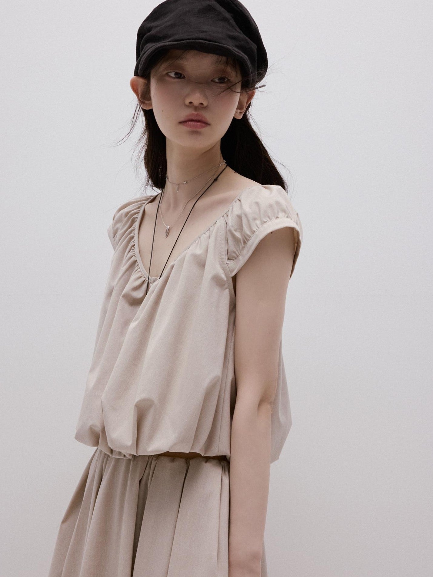 FUSSED Apricot Gray Puff Texture V-neck Women&