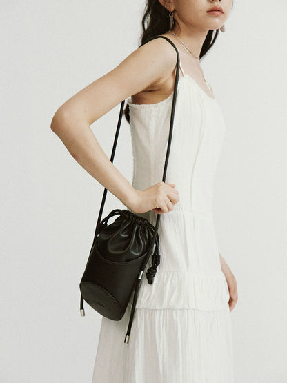 FUSSED_Asymmetrical_Geometric_Drawstring_Pu_Crossbody_Bag_Black_MISSTT