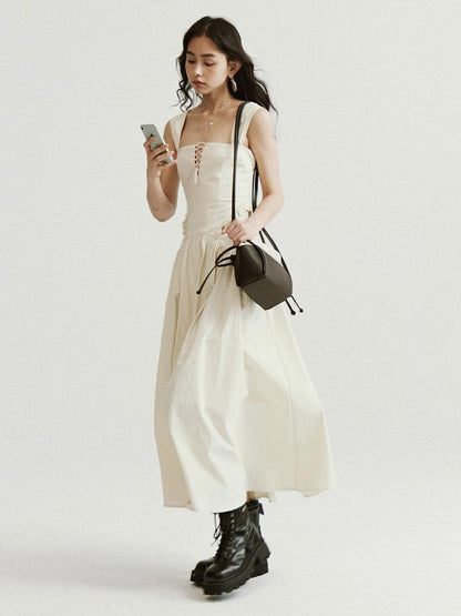 FUSSED Brown Leather Beige Canvas Drawstring Basket Bag