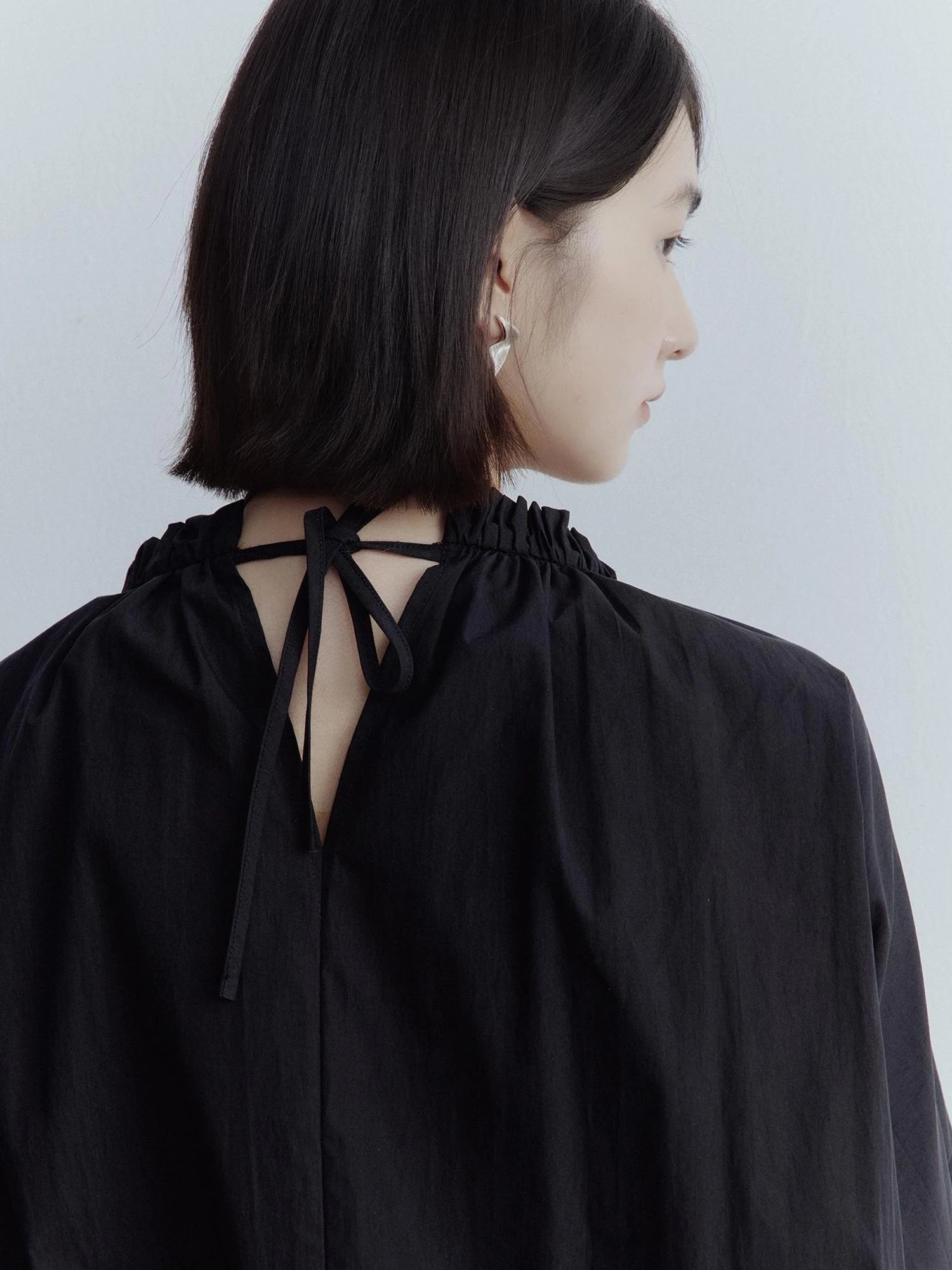 Dual Personality Reversible Black Top