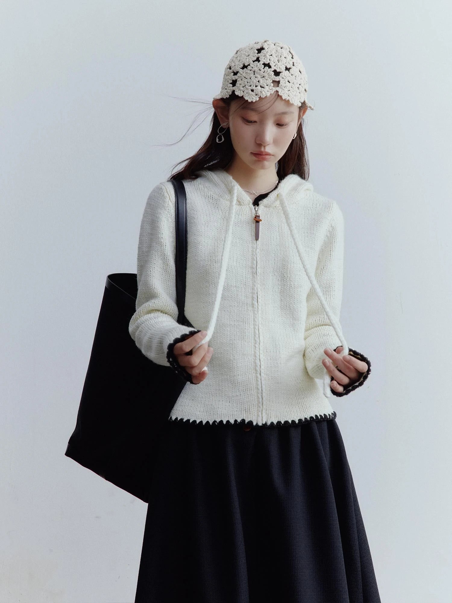 Hand Knitted Snowflake Beanie In Almond Cream