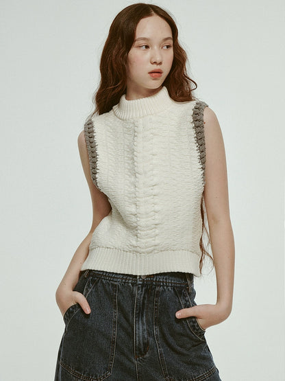 FUSSED_Hand_Knitted_White_Grey_Textured_Vest_With_3D_Floral_Applique_MISSTT