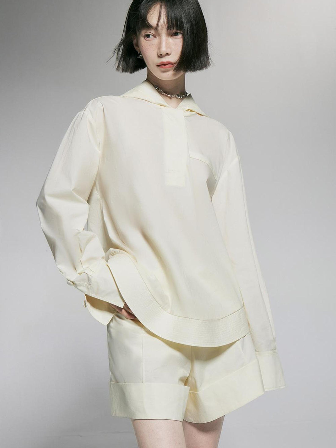 FUSSED Ivory Cotton Wide Leg Shorts With Pleats And Cuffed Hem