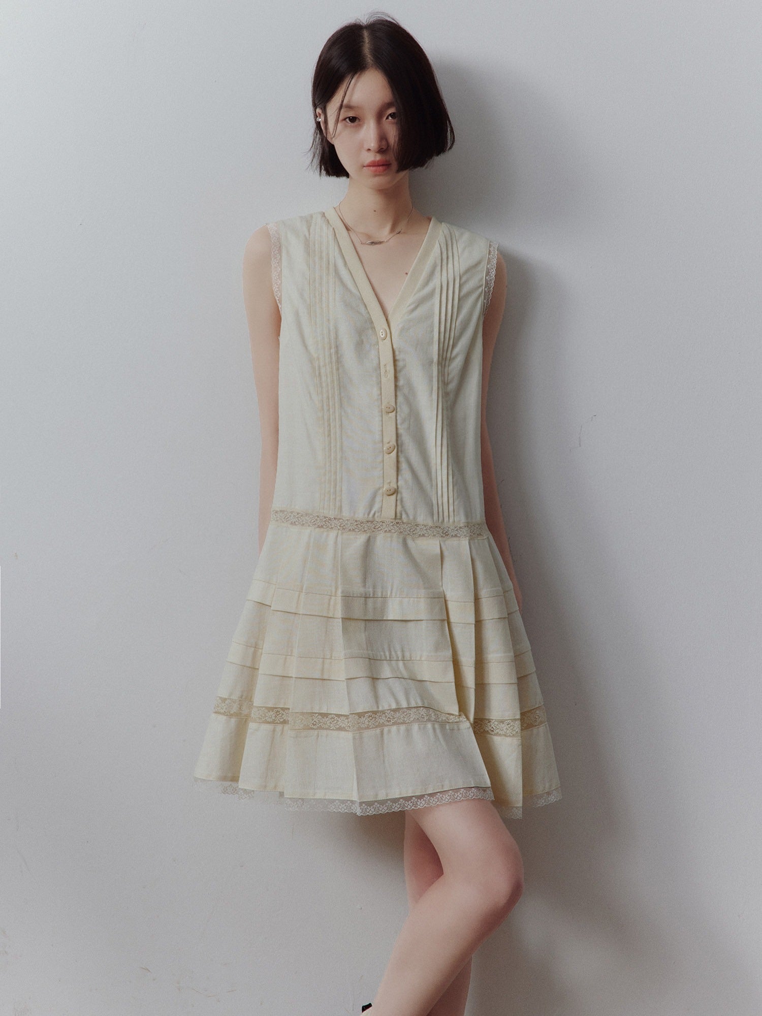 FUSSED_Ivory_Fabric_Contrast_Pleated_Accordion_V-neck_Women&