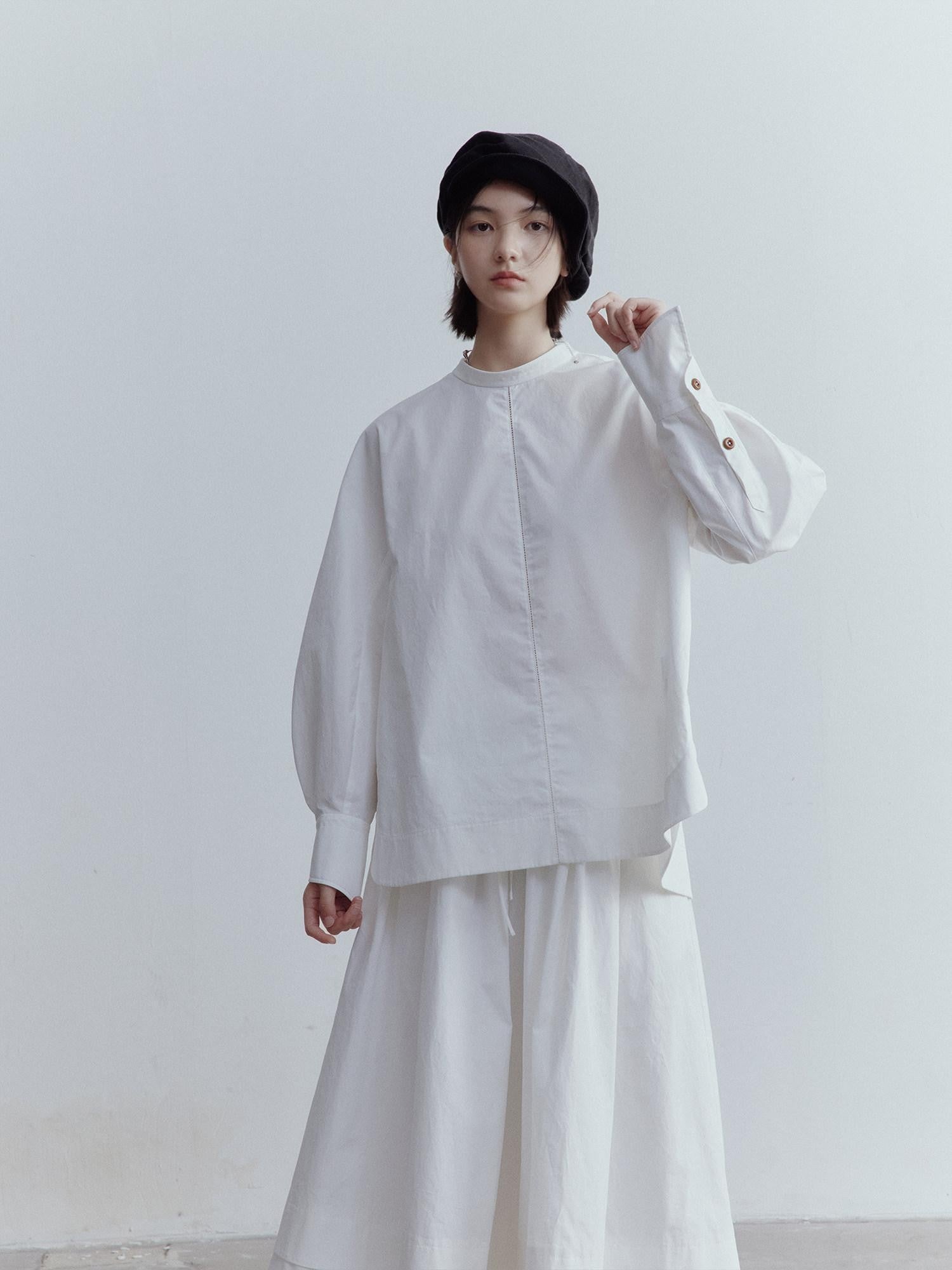 FUSSED Mist White Oversized Asymmetric Sleeve Cutout Splice Women&