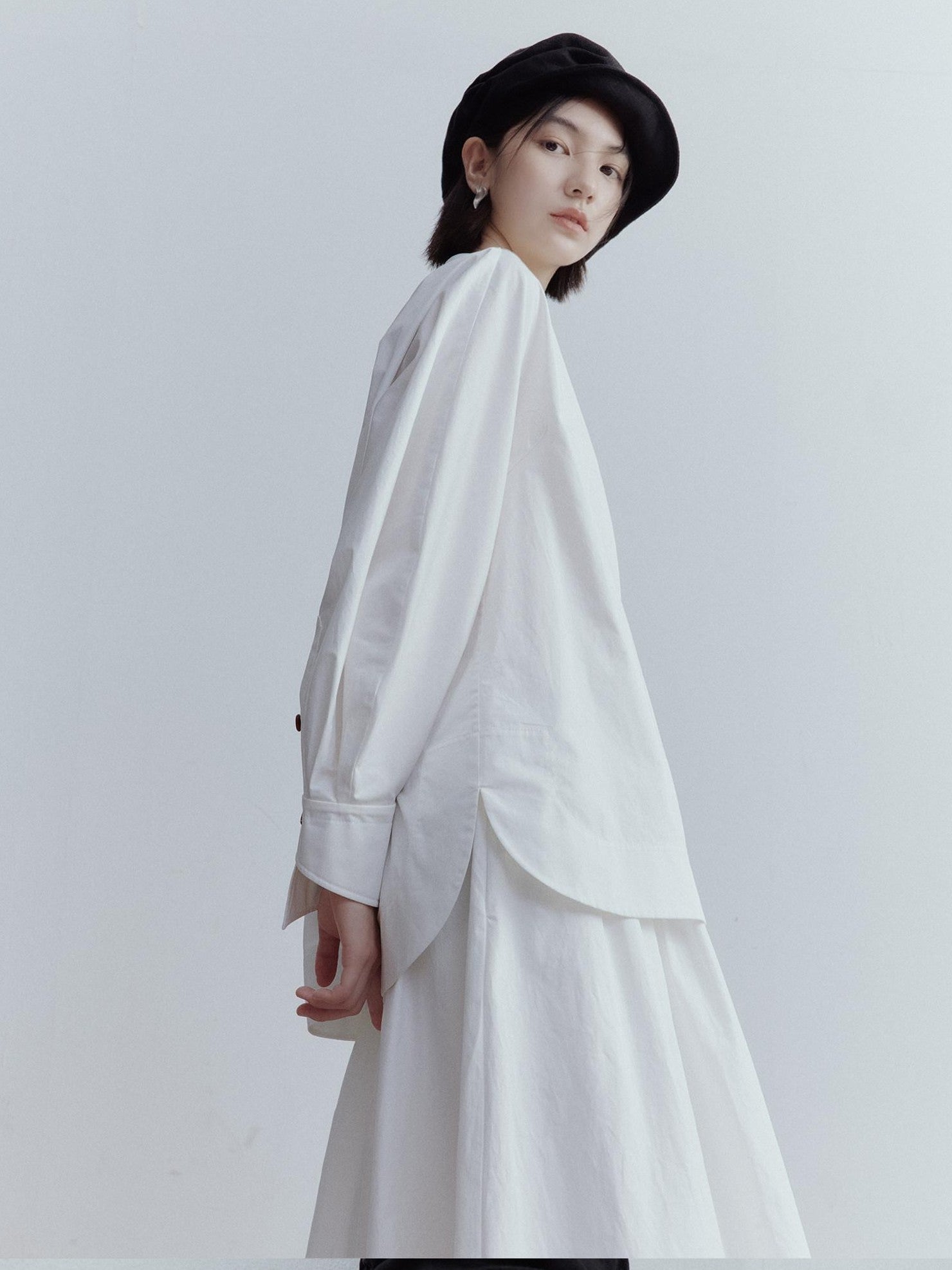 FUSSED Mist White Oversized Asymmetric Sleeve Cutout Splice Women&