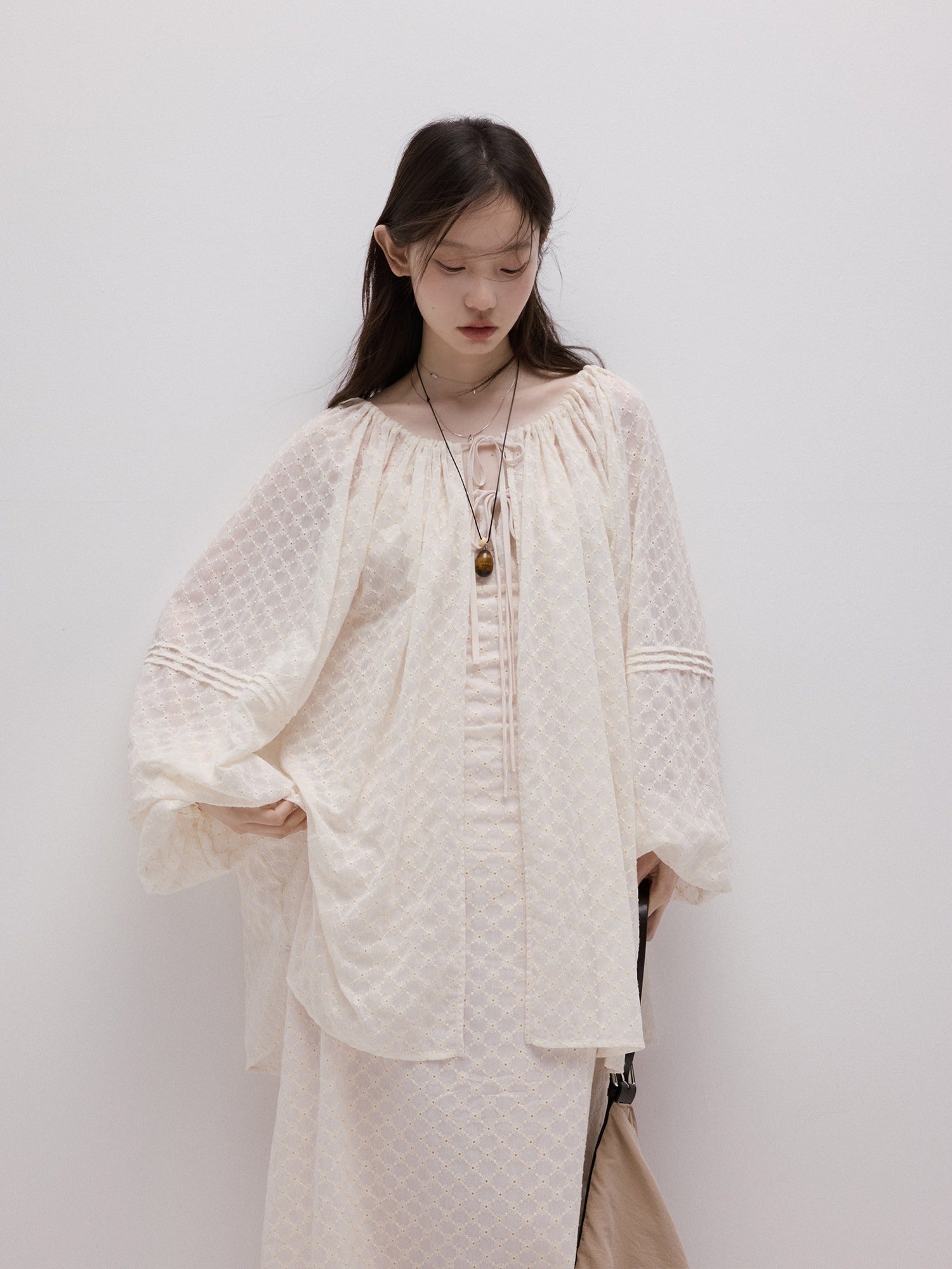 FUSSED_Pearl_White_Embossed_Daisy_Embroidery_Raglan_Women&
