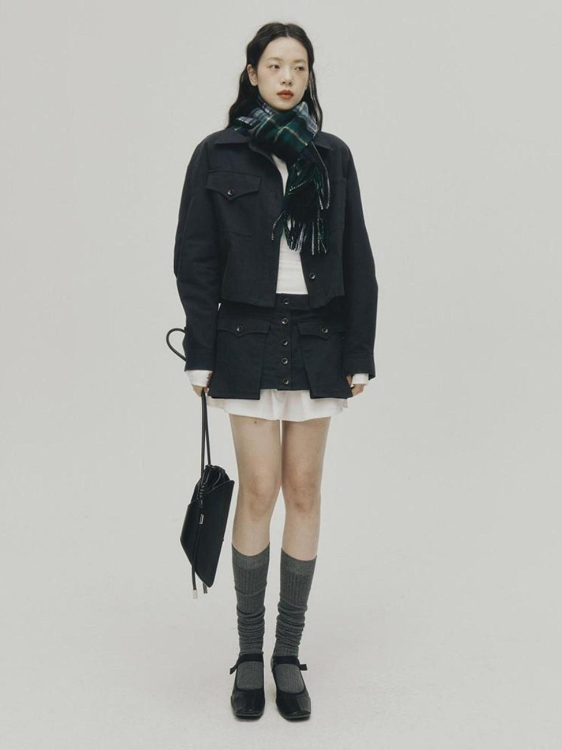 FUSSED Structured Pleated Mini Skirt With Asymmetric Pocket In Dusk Blue