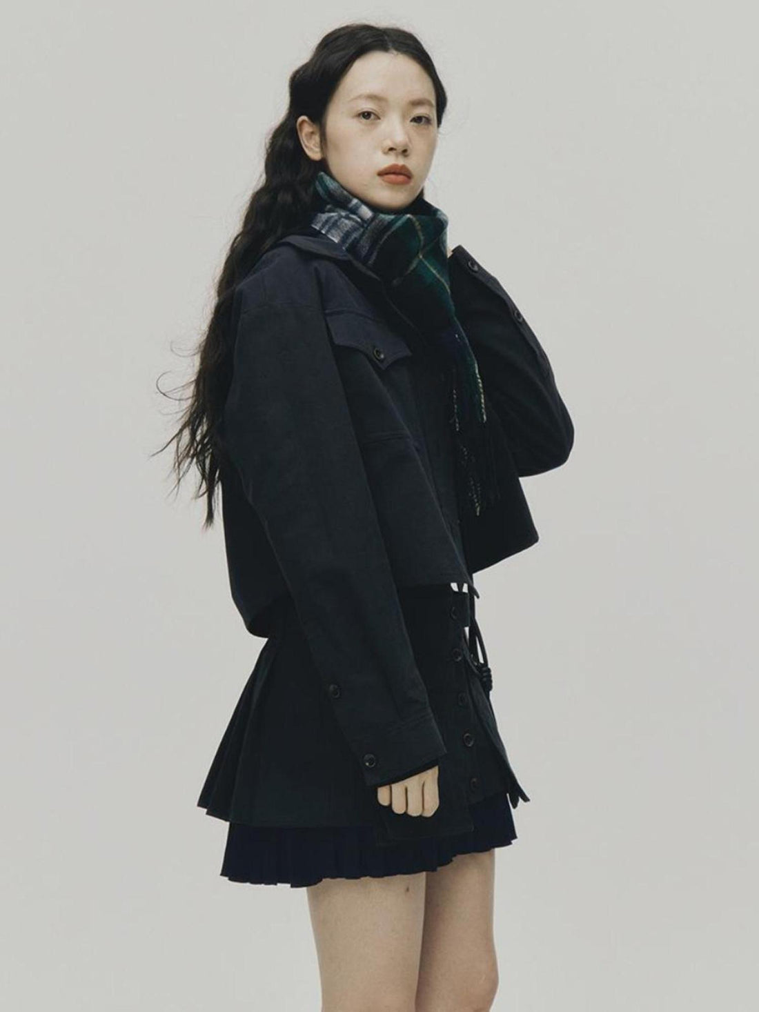 FUSSED Structured Pleated Mini Skirt With Asymmetric Pocket In Dusk Blue