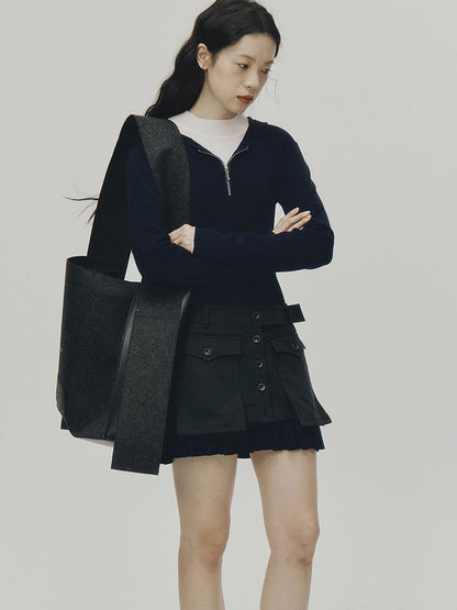 FUSSED Structured Pleated Mini Skirt With Asymmetric Pocket In Dusk Blue