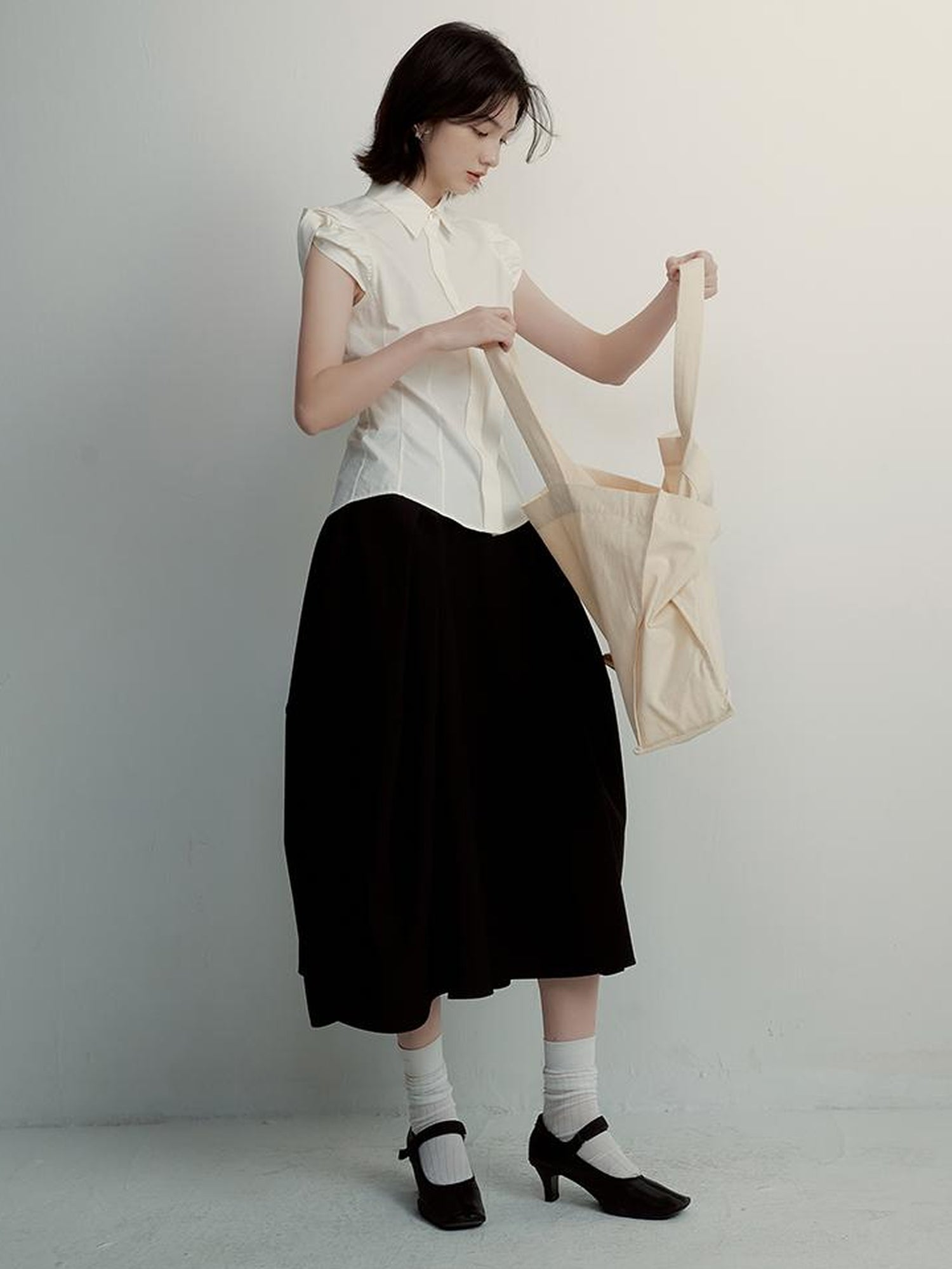 FUSSED Tencel Black Cocoon Midi Skirt With Pleats Draping