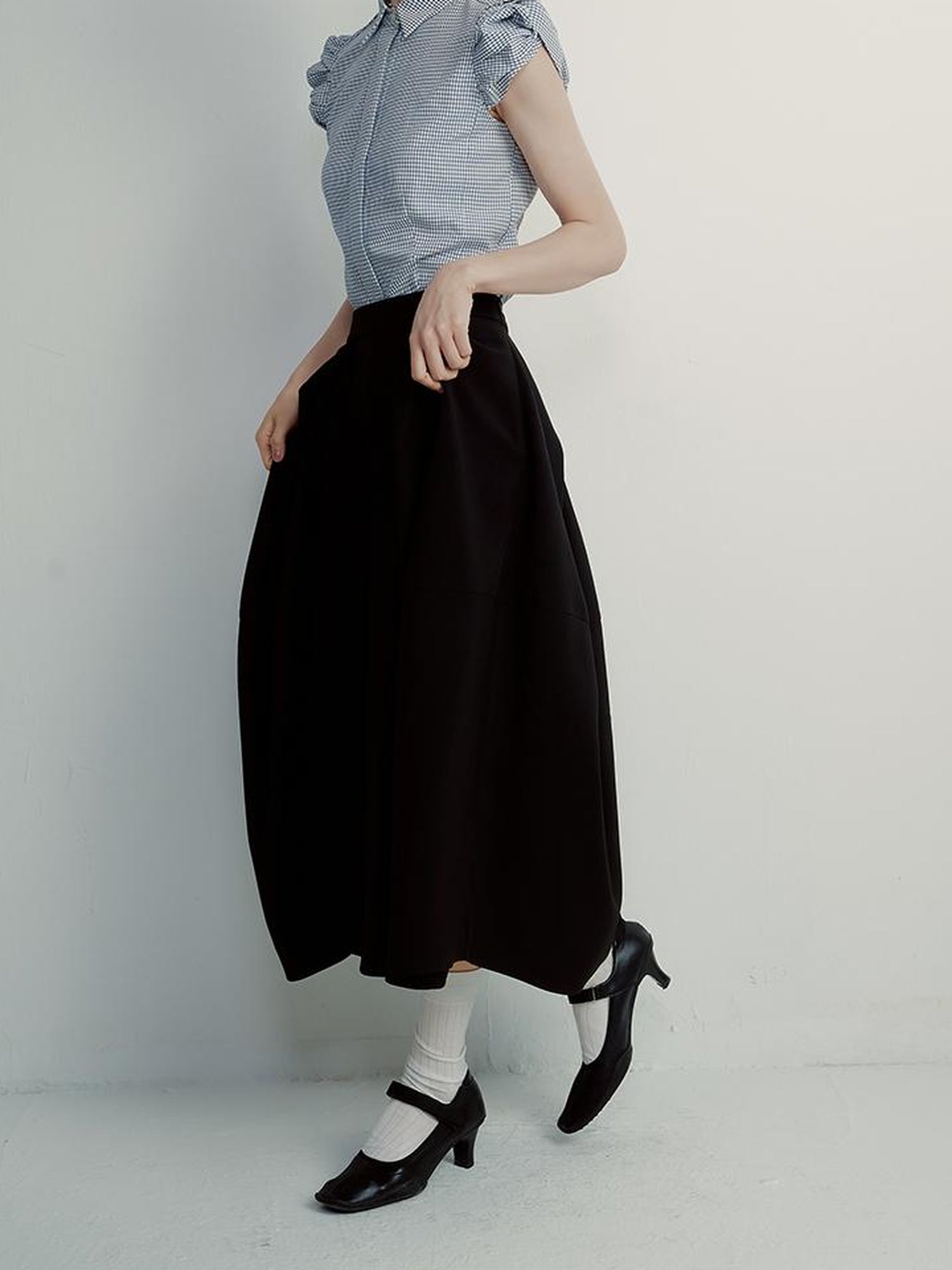 FUSSED Tencel Black Cocoon Midi Skirt With Pleats Draping