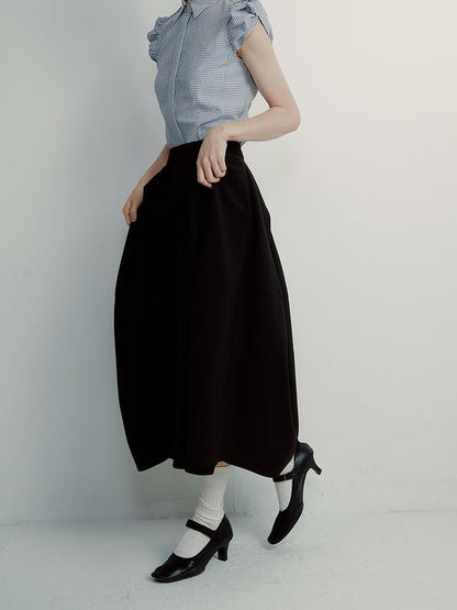 FUSSED Tencel Black Cocoon Midi Skirt With Pleats Draping