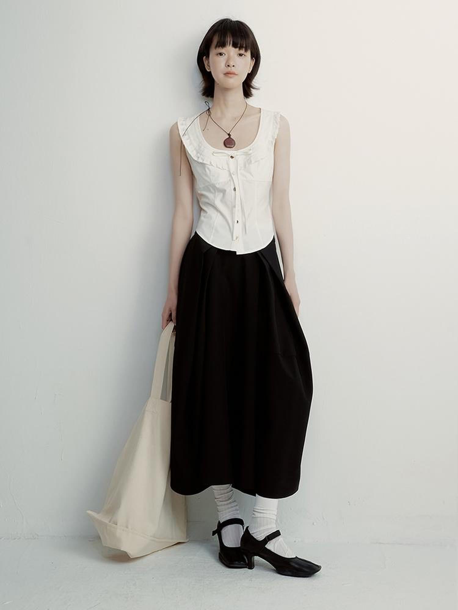 FUSSED Tencel Black Cocoon Midi Skirt With Pleats Draping