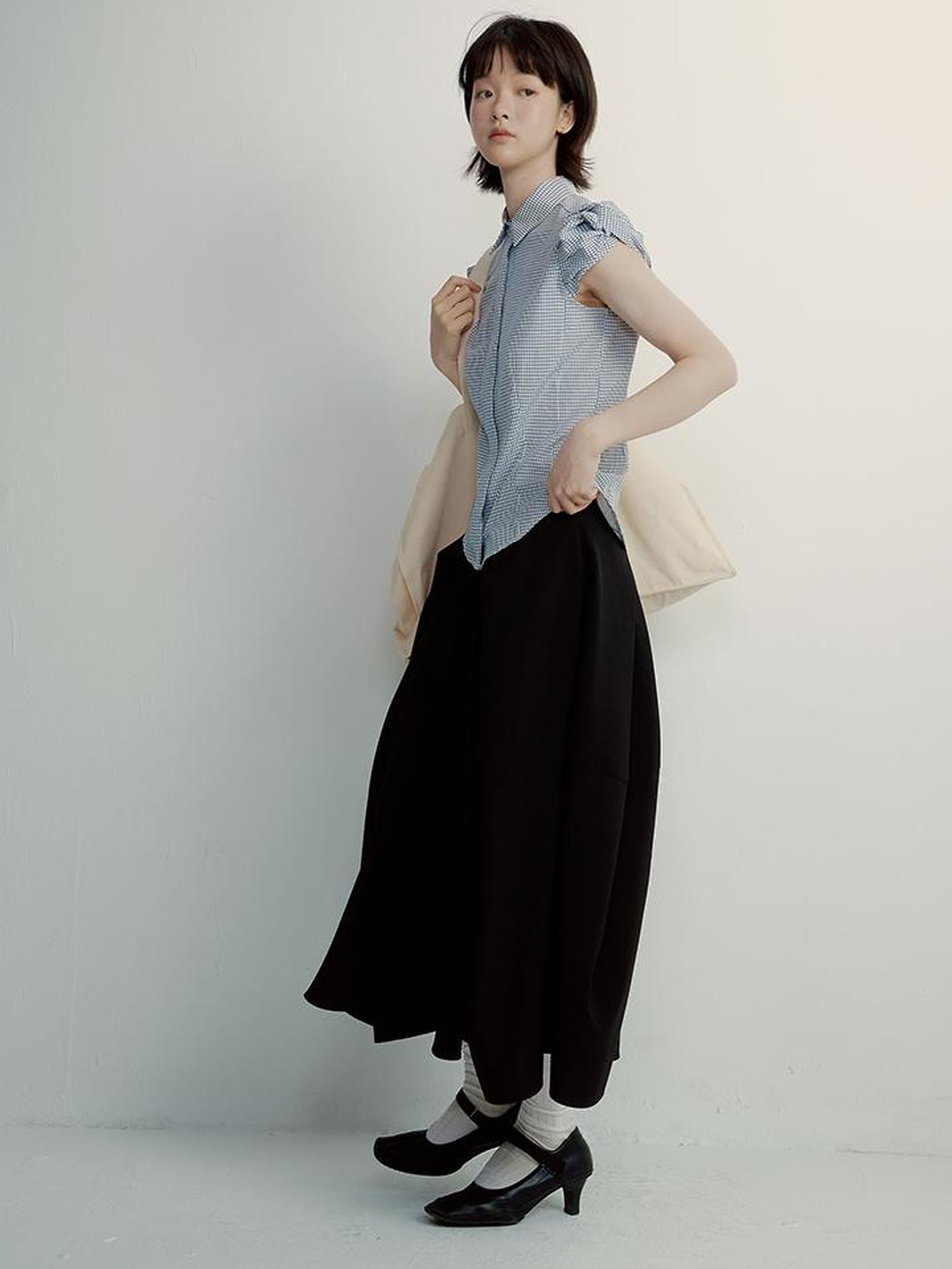 FUSSED Tencel Black Cocoon Midi Skirt With Pleats Draping