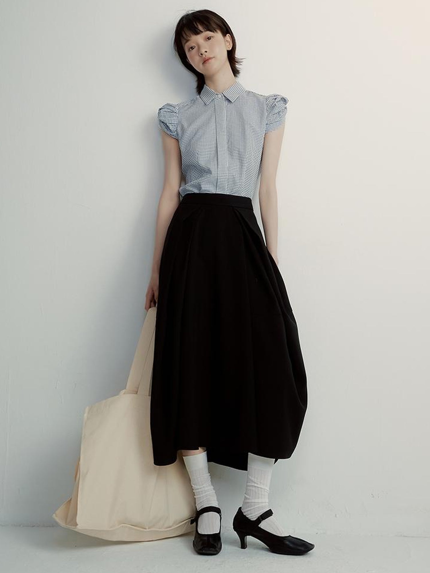 FUSSED Tencel Black Cocoon Midi Skirt With Pleats Draping