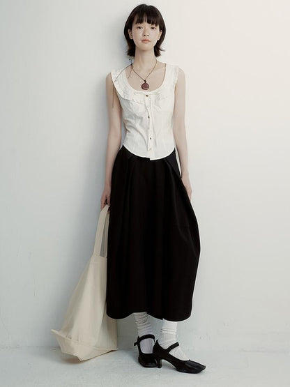 FUSSED Tencel Black Cocoon Midi Skirt With Pleats Draping
