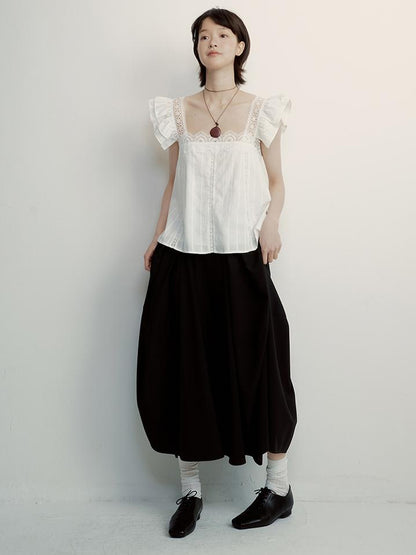 FUSSED Tencel Black Cocoon Midi Skirt With Pleats Draping