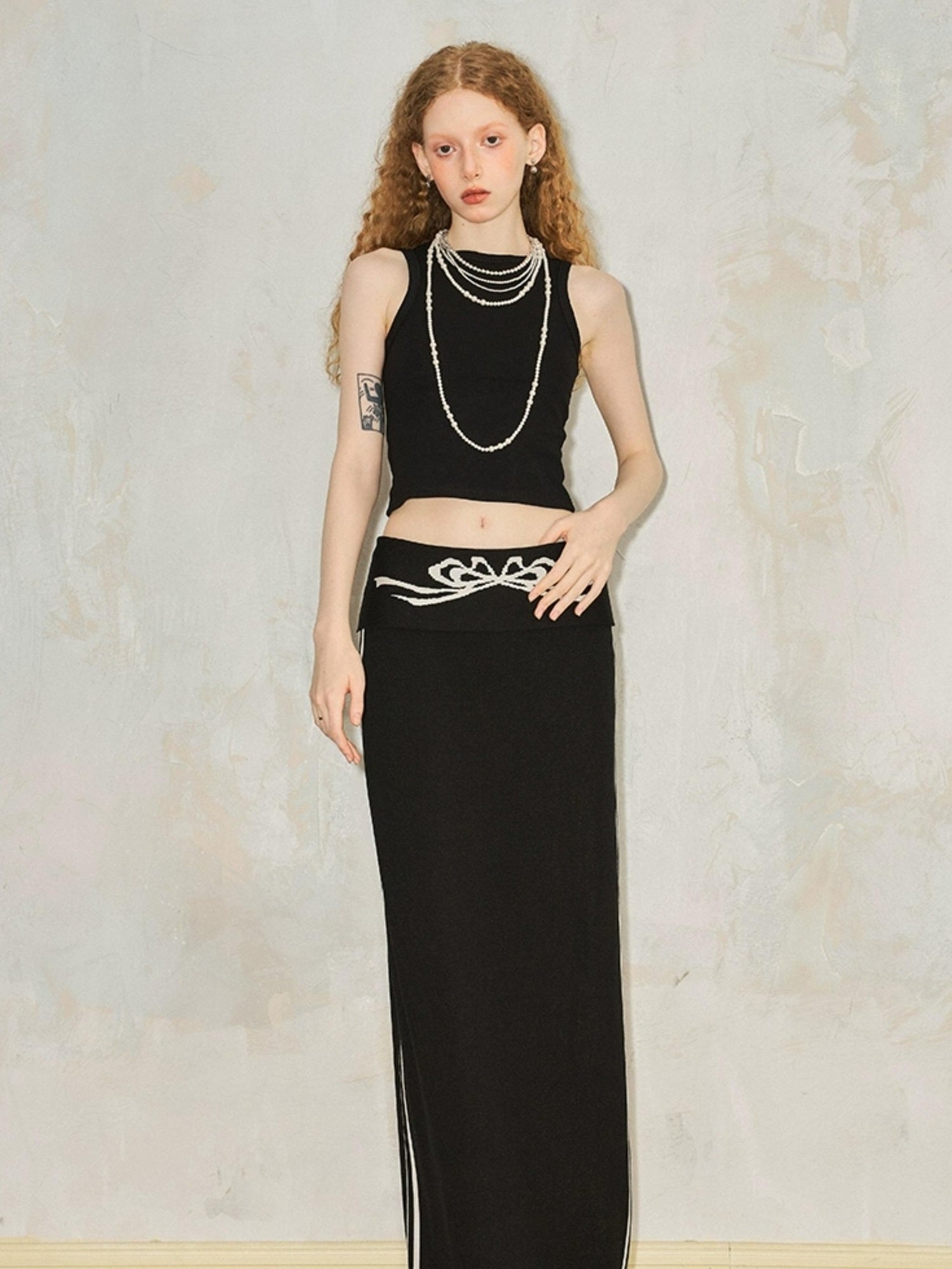 DIDDI MODA Flip Waist Bow Jacquard Knit Skirt