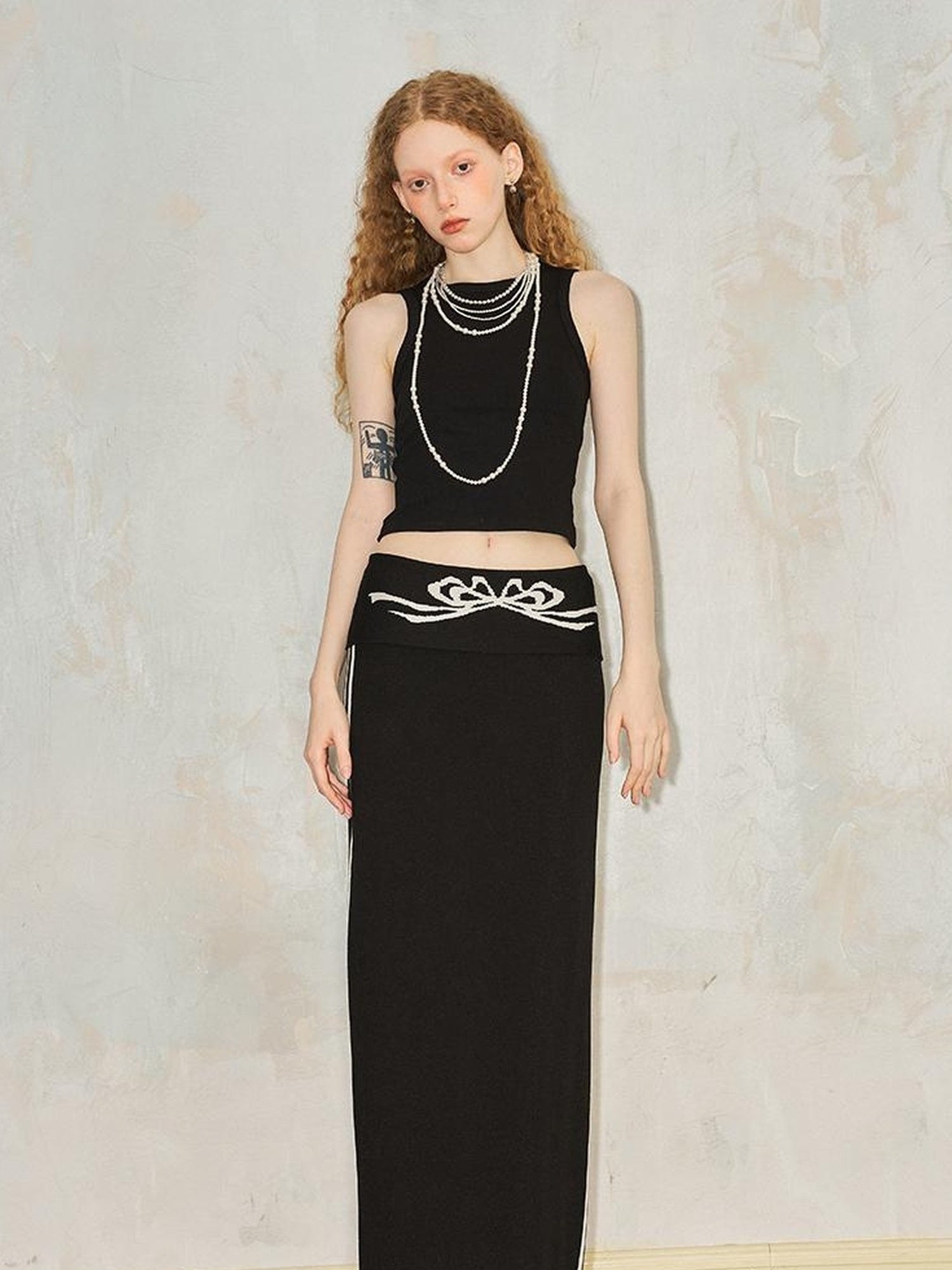 DIDDI MODA Flip Waist Bow Jacquard Knit Skirt