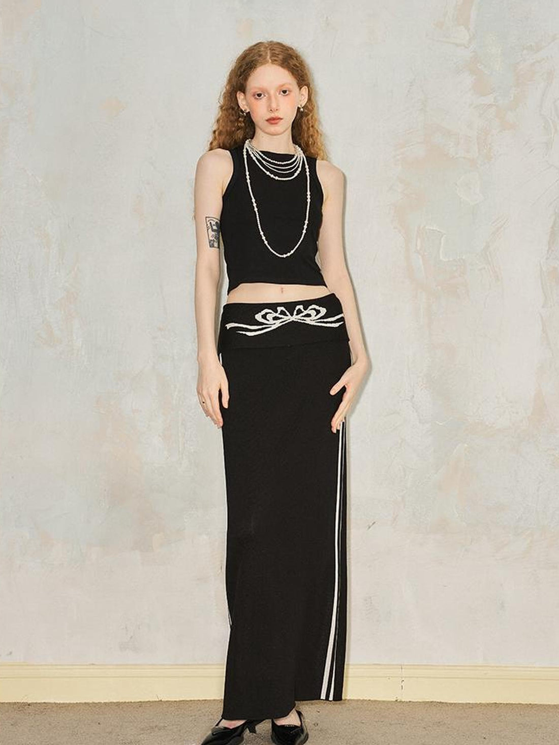 DIDDI MODA Flip Waist Bow Jacquard Knit Skirt