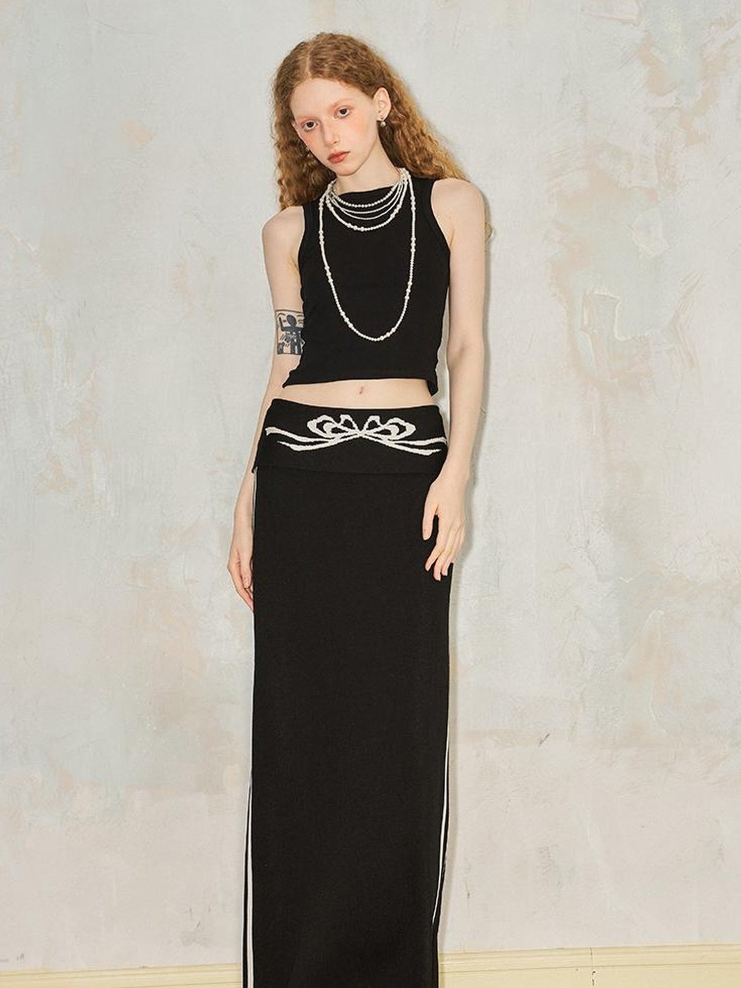 DIDDI MODA Flip Waist Bow Jacquard Knit Skirt