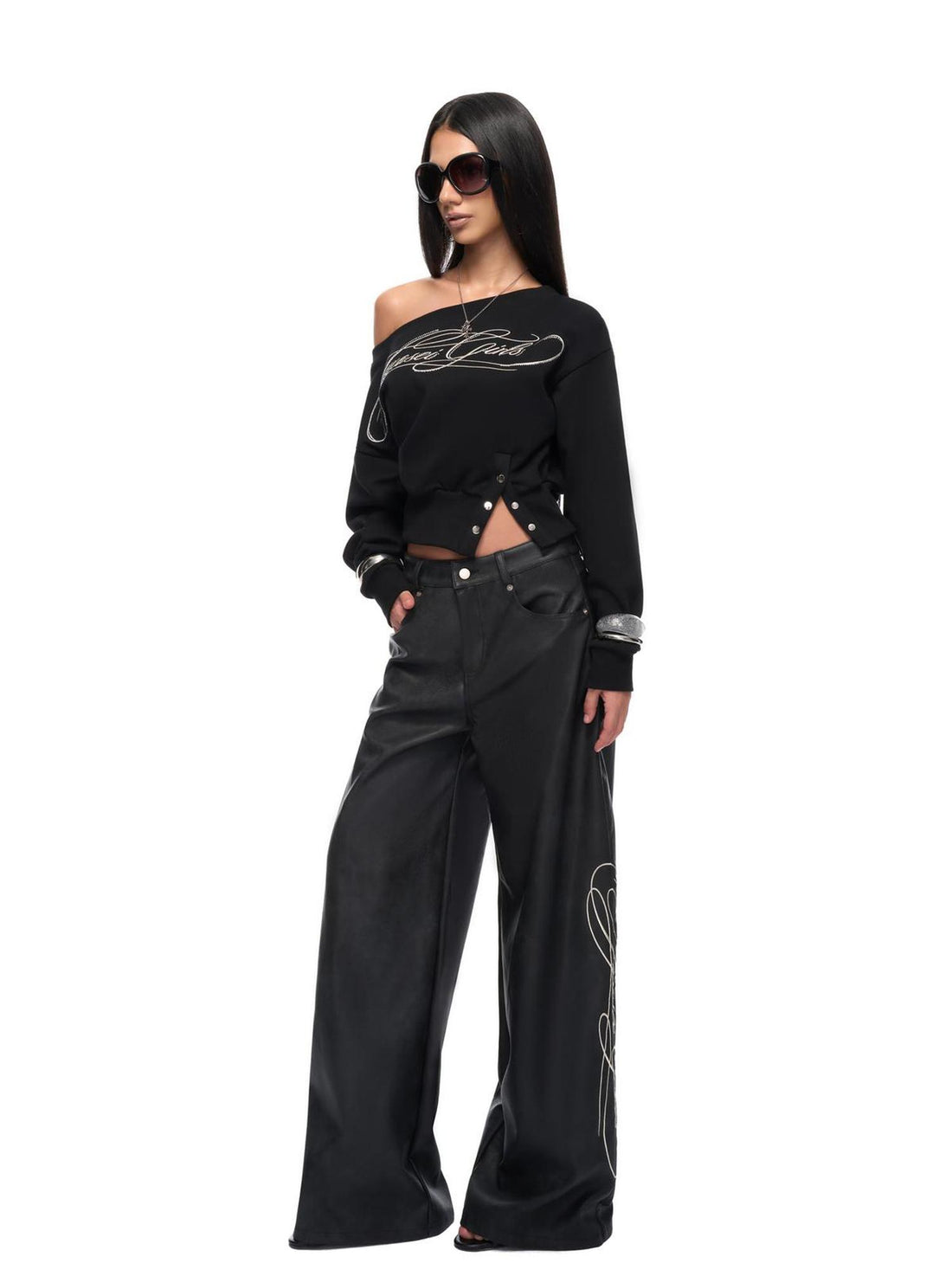 JYOSEI Off Shoulder Embroidered Crop Hoodie with Wide Leg Low Rise Leather Pants Set