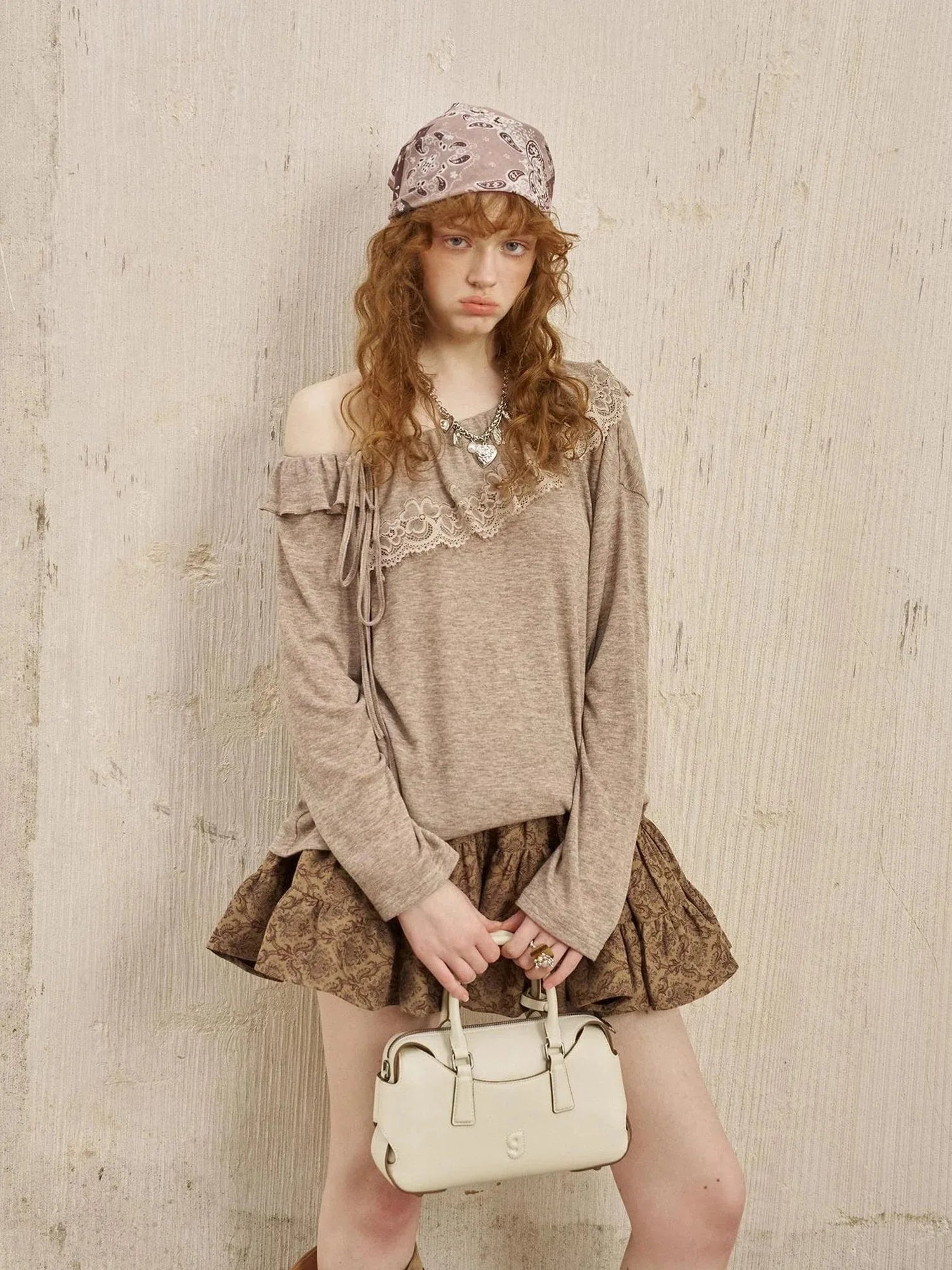 Lace Paneled Ruffle Knit Top